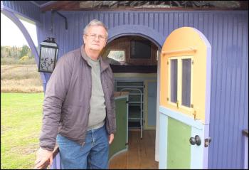 John Kazneki owner of the Gypsy Traveler welcomes you inside. (Photos by Chris Wolf)
