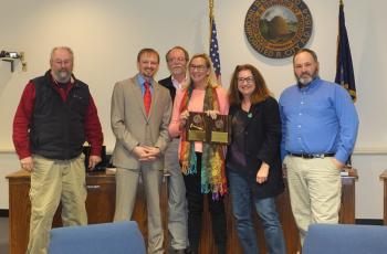 Former Mayor Louise MacLellen-Ruf accepts her plaque
