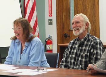 County Commissioners Carol Maines and Rick Parent Jr. enjoy a light hearted moment during the discussion.