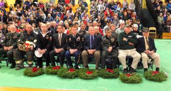 American Veterans receiving wreaths