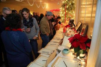The Lincolnville Christmas Social, held Dec. 3 at the Community Building, raised nearly $2,500 for the Historical Society via a silent auction of donated goods and services. (Photo by Michael O’Neil)