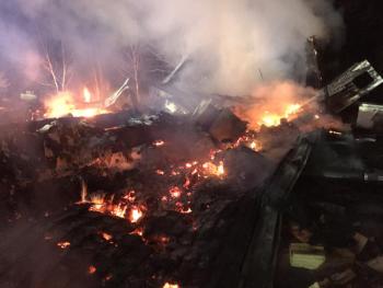 The early morning fire at the home of 64-year-old Bruce Fales, on Vinal Street in Rockport, early Tuesday morning completely destroyed the residence, partly because it was so far along by the time it was spotted by a young neighbor boy who woke up and saw the flames through the woods. (Courtesy Rockport Fire Department)