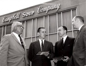 Pecorelli, second from right, talks with businessmen of the Campbell’s Soup Company. (Photo courtesy of Carmine Pecorelli)