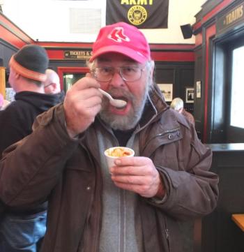 Rockland Councilor Ed Glaser tries a big bite of chili.