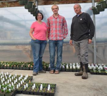 Wendy, Daniel and Bruce Reinemann, in their new greenhouses. (Photo by Lynda Clancy)