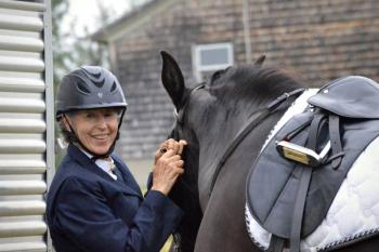 Debbie Faulkner getting Mocha Joe ready for her class. (Courtesy Chelsea Lord)