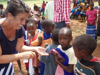 Michelle Bianchi, Founder/Director of the Michelle and Frederick Bianchi Education Foundation, with a group of school children in Kenya.