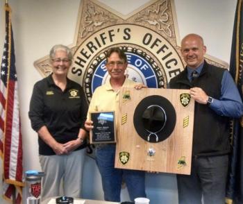Sheriff Donna Dennison and Chief Deputy Tim Carroll recognize Deputy John Hansen who is retiring after 25 years in law enforcement. (Photo courtesy of Knox County Sheriff’s Office)