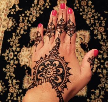 Intricate symmetrical designs on the back of the hand symbolize defense and protection. (Photo courtesy Saadiya Boutote)