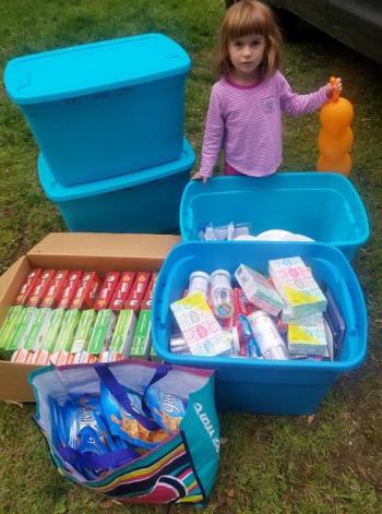 Volunteers of all ages gathered supplies to be distributed by Juan Alcala and Nathan Bernier in Florida.