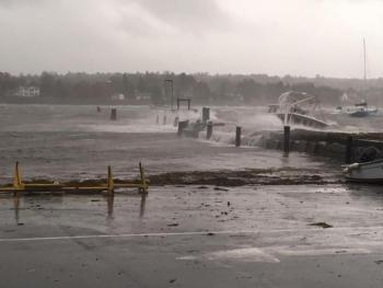 A boat can be seen getting battered by waves during the storm, near Belfast’s downtown boat landing early Oct. 30. (photo courtesy of the Belfast Police Department)
