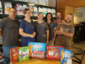 The animal shelter in St. Augustine received 30 boxes of cat and dog food and several cases of canned pet food.