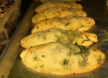 Some of Nana Bucci’s famous spinach pies fresh out of the oven. SUZI THAYER/Boothbay Register