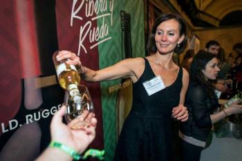 Maia Gosselin, wine educator extraordinaire, pouring wine. Courtesy of James Coletta
