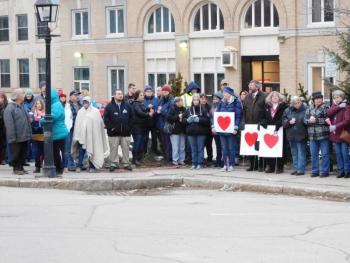 A crowd gathers in Belfast Town Square for a vigil for Marissa Kennedy,
the little girl allegedly slain by her mother and stepfather. (photo by Erica Thoms)