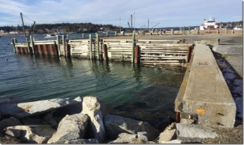 A shot of the newer property from the existing town wharf, and the larger of the two “notches”, which will also be filled, thus almost doubling the surface area. (Photo courtesy Dave Schmanska)