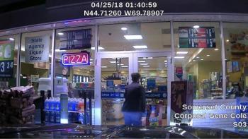 Suspect at the counter. (Photo courtesy Maine Office of Public Safety)