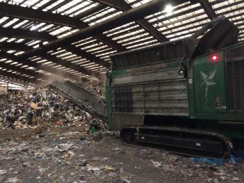 Unloading on the PERC tipping floor (Photo courtesy Eva Murray)