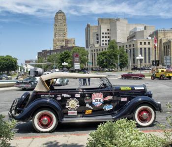 The 1935 Ford Phaeton, driven by members of the Owls Head Transportation Museum.