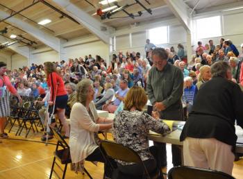 Residents register to vote at the door. (Photo by Lynda Clancy)