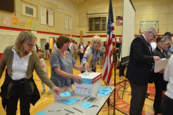 Counting ballots. (Photo by Lynda Clancy)