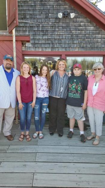 SGBA Board members Jake Miller (left) and Rosemary Limmen (right) introduced Julia Kurr (second from left)—Oceanside H.S. graduate and SGBA’s 2018 scholarship award winner from St. George—and her family to the organization’s members and guests at an SGBA after-hours event hosted by Luke’s of Tenants Harbor on Tuesday evening, June 19, 2018. (Photo courtesy of the St. George Business Alliance)