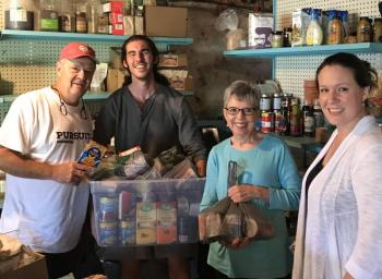 L to R: Jack Knight, Ben Morrow, Carolyn Herr from The Pursuit Church Outreach, and Becca Gildred of Knox County Homeless Coalition. (Photo courtesy of Knox County Homeless Coalition)