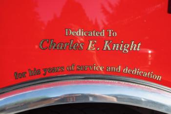 The inscription honoring Charlie Knight on Rockport's new firetruck. (Photo by Peter Ralston)