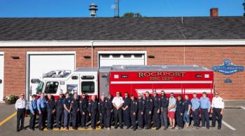 Members of the Rockport Fire Department stand proudly in front of “Squad 25” following the dedication to Charlie Knight. (Photo by Peter Ralston)