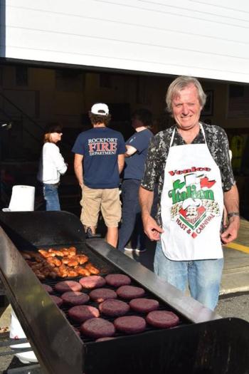 Town Manager Rick Bates took charge of the grill. (Photo courtesy of Rockport Fire Department)