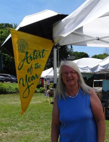 Artist Sandy Dolan is 2018’s Artist of the Year. (photo by Erica Thoms)