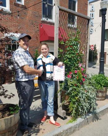 Jason Merriam, Rockland Main Street, Inc. Design Committee Co-chair and Jennifer Rockwell, General Manager of Ada’s Kitchen. (Photo courtesy of Rockland Main St.)