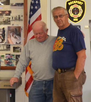 Bruce Woodward and former Camden Fire Chief Bob Oxton recount a few stories. (Photo by Lynda Clancy)