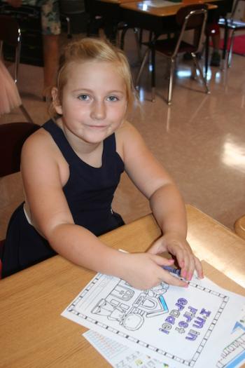 Naomi Thompson settles in to 1st grade. (Photo courtesy Thomaston Grammar School)