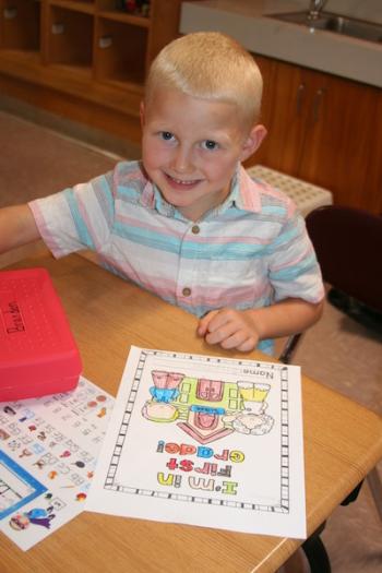 Brayden Shirey colors his 1st grade work.(Photo courtesy Thomaston Grammar School)