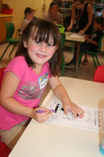Khaleesi Breton works hard on her first day of kindergarten. (Photo courtesy Thomaston Grammar School)