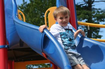 Jude Whitney gets ready to go down the slide. (Photo courtesy Thomaston Grammar School)