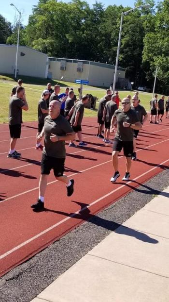 Chief Trundy (closest to camera) competing in a fitness challenge during the second week of the program. (photo courtesy of Chief Deputy Trundy)