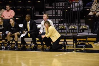 Carroll LaHaye (yellow) during a game for the Randolph-Macon women’s basketball team. (Courtesy Randolph-Macon College)