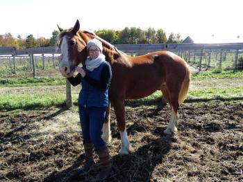 Kristine Lerner poses with her horse Derek. (photo by Erica Thoms)