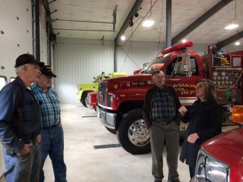 Marylee Hanley, Manager of Stakeholder/Community Engagement of Enbridge, (right) visited the new Searsmont fire station with (l. to r.) Fire Chief James Ames, Assistant Fire Chief Wayne Woodbury, and Searsmont First Selectman Bruce Brierley. (Photo by Lara Bailey)