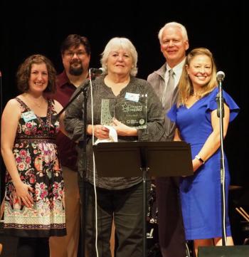 Pictured L-R with Unsung Hero Kathy Beck, center, are Meredith Batley, Knox County Health Clinic, Dan Dunkle of Courier Publications, John Viehman, UMC Board President, and Megan Williams, UMC Executive Director. Kathy was chosen for this award from a host of inspirational volunteer nominees.