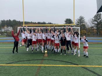 Camden Hills celebrating its third consecutive state championship. (Courtesy Steve Alex)