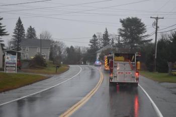 A scene from the escort given to the Camden Hills team by the Rockport and Camden Fire and Rescue Departments, Camden and Rockport police departments, and North East Mobile Health Services. (Courtesy Rockport Fire Department/Facebook)
