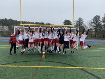 Camden Hills celebrating its third consecutive state championship. (Courtesy Steve Alex)