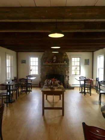 Briar Patch boasts a clean but intimate aesthetic augmented by an impressive stone fireplace. (Photo by Jenna Lookner)