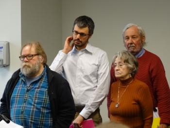 Speakers wait for their chance at the podium. (photo by Erica Thoms)