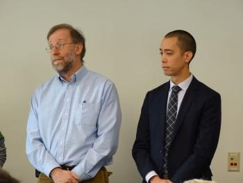 Rockport Select Board member Ken McKinley and Lincolnville Select Board member Josh Gerritsen deliver their towns’ support of Islesboro. (Photo by Erica Thoms)