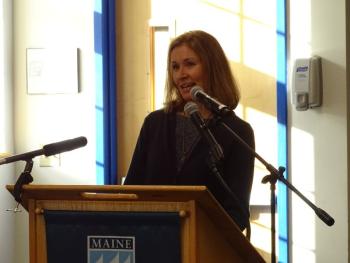 An Islesboro teacher addresses the crowd, which included a number of island students. (photo by Erica Thoms)