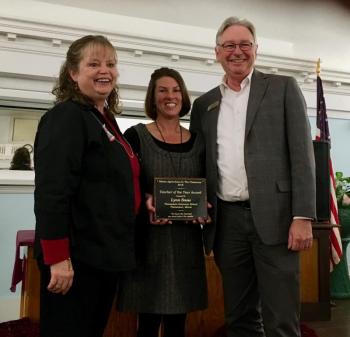 Willie Sawyer Grenier (ME Ag in the Classroom executive director), Lynn Snow (2019 Teacher of the Year), and Ron Dyer (Agriculture, Food, and Rural Resources Bureau director). Taken at the Maine Agriculture in the Classroom Annual Meeting held at the Maine State Grange Headquarters in Augusta on October 24, 2018. (Photo courtesy of Thomaston Grammar School)